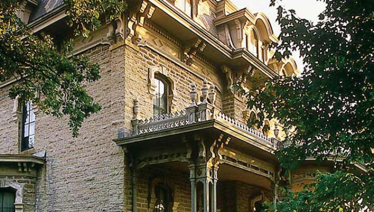 Early evening summertime photo of Alexander Ramsey House porch